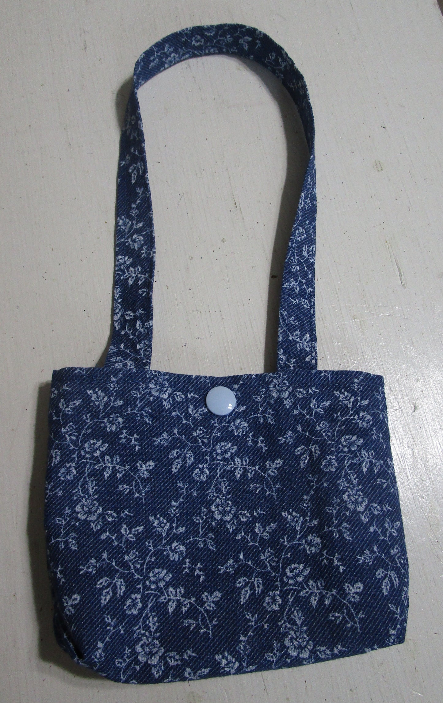 Blue denim cross body bag