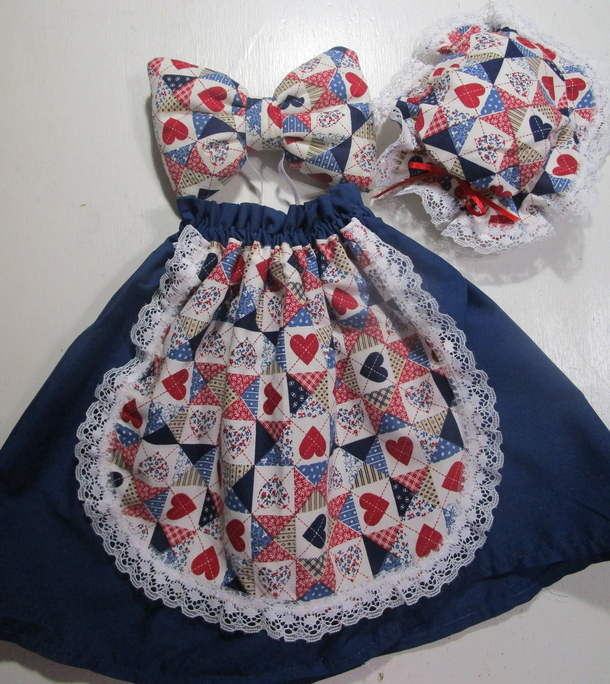 Navy blue dress with hat and bow