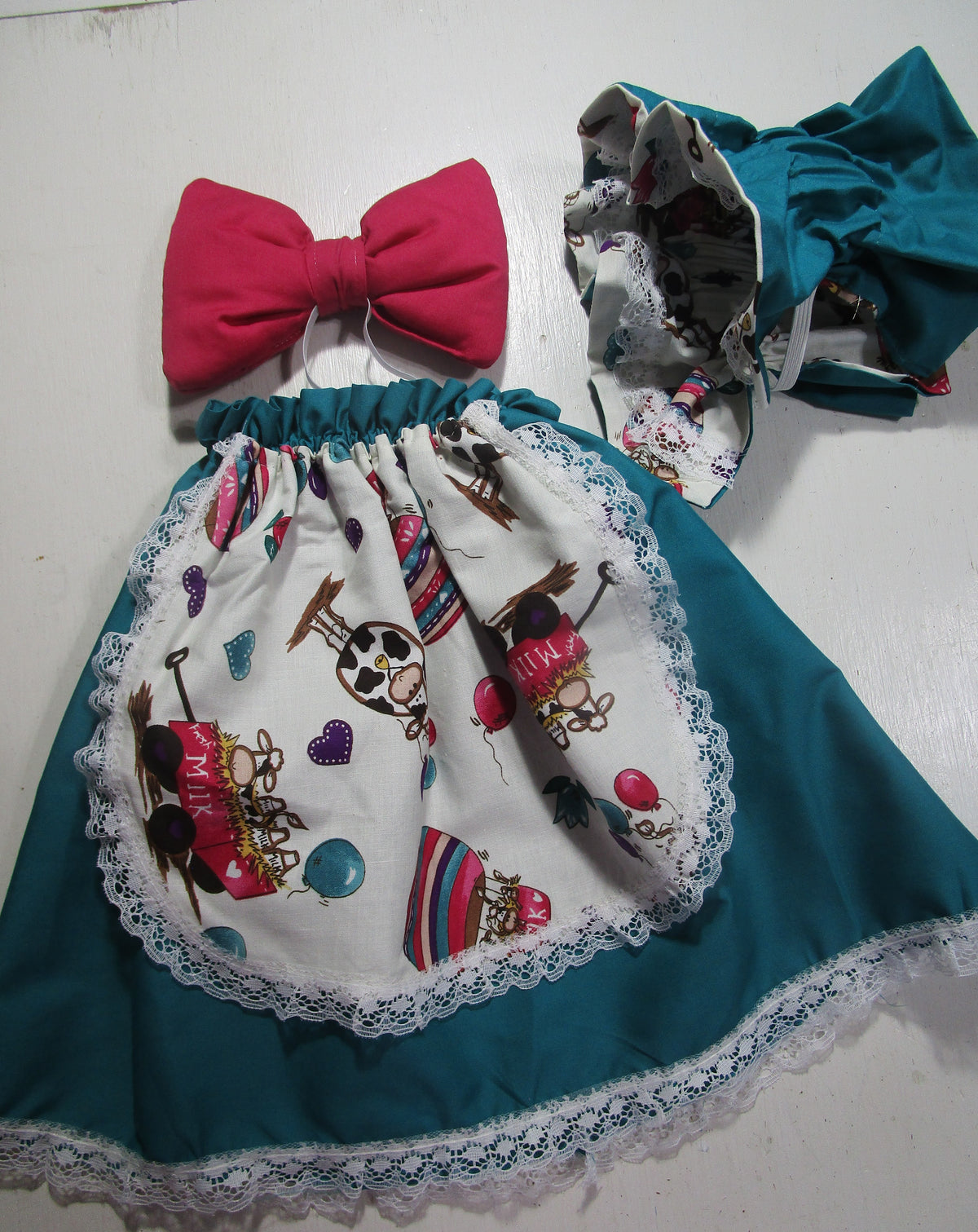Teal dress, hat and bow