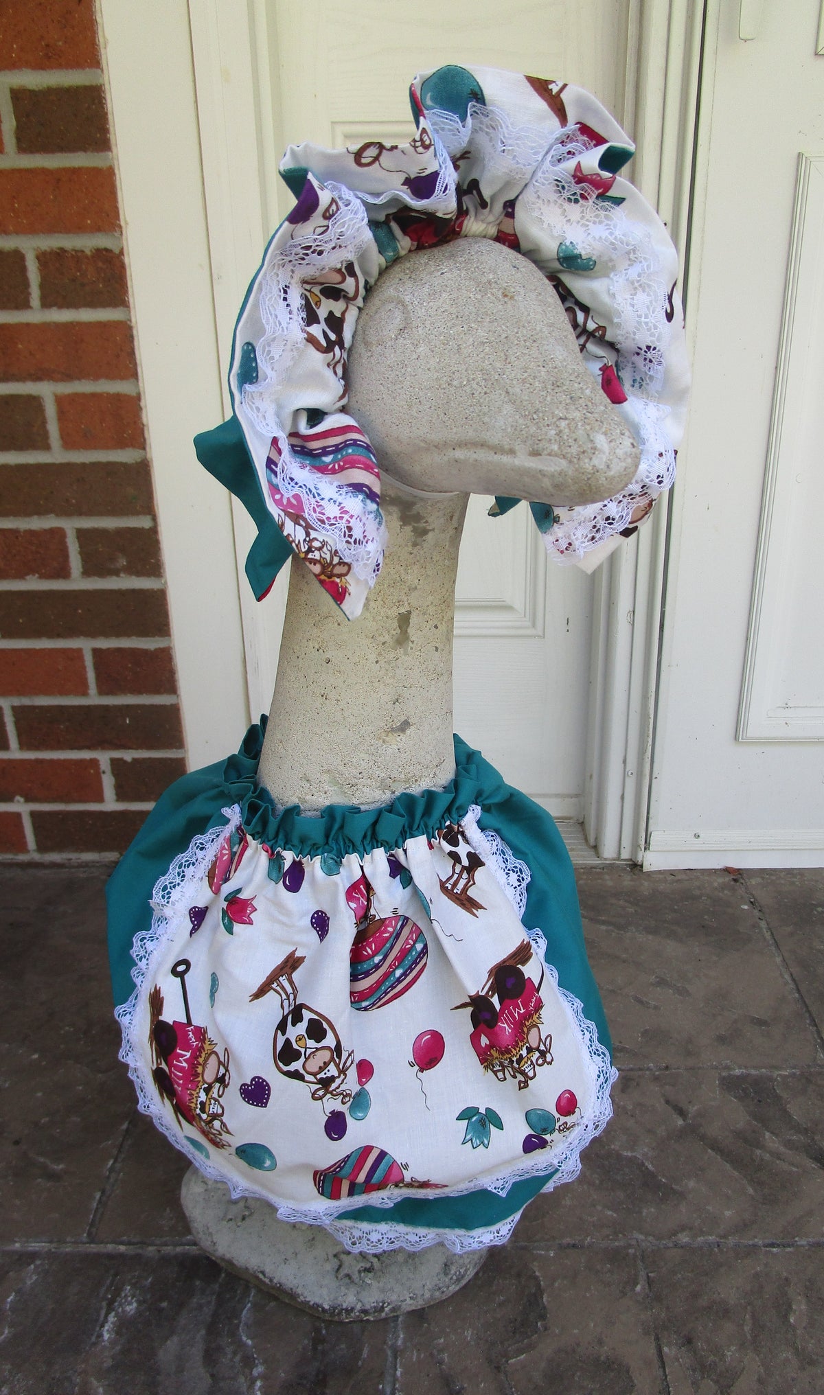 Teal dress, hat and bow